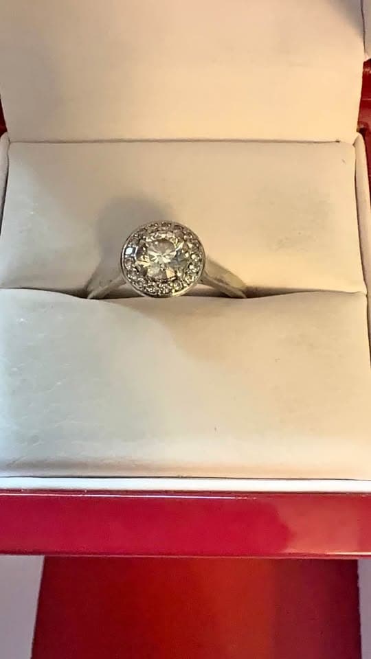 Halo Engagement Ring with 18K Gold Band. Center diamond .5 carat round brilliant.
